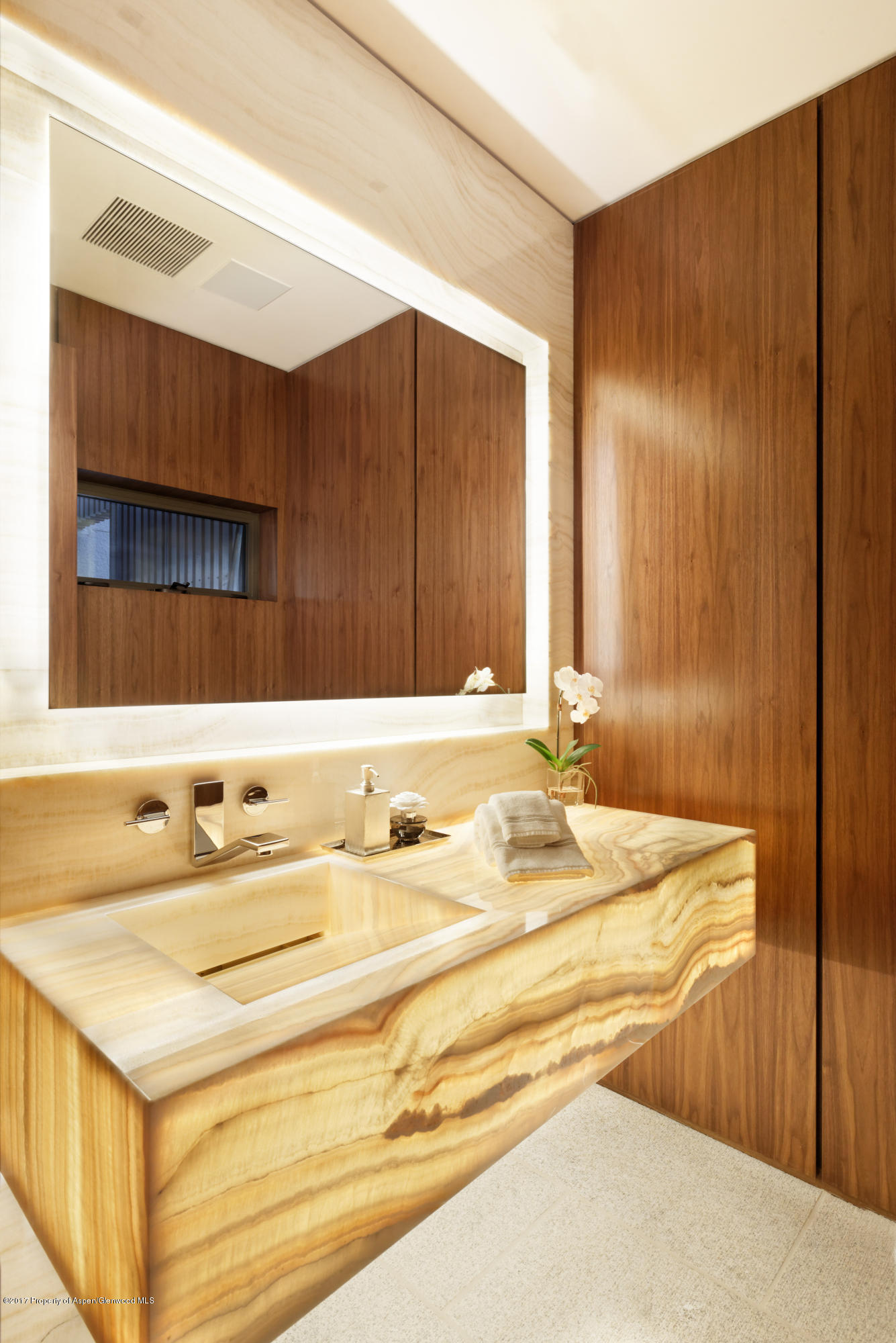 135 Miners Trail Road Aspen, CO 81611 - Photo 22 of 41 a bathroom with a sink and a mirror