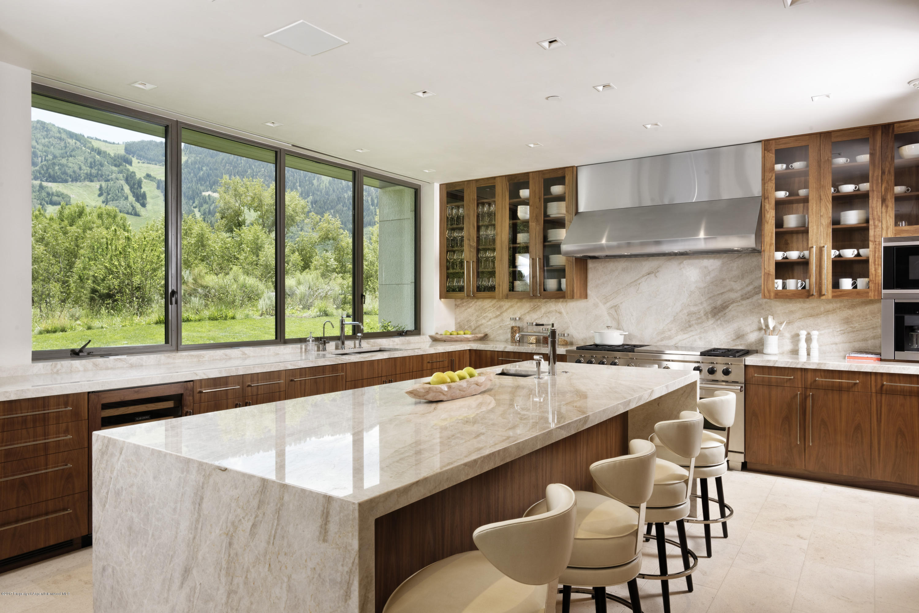 135 Miners Trail Road Aspen, CO 81611 - Photo 5 of 41 a kitchen with granite countertop a sink and a stove