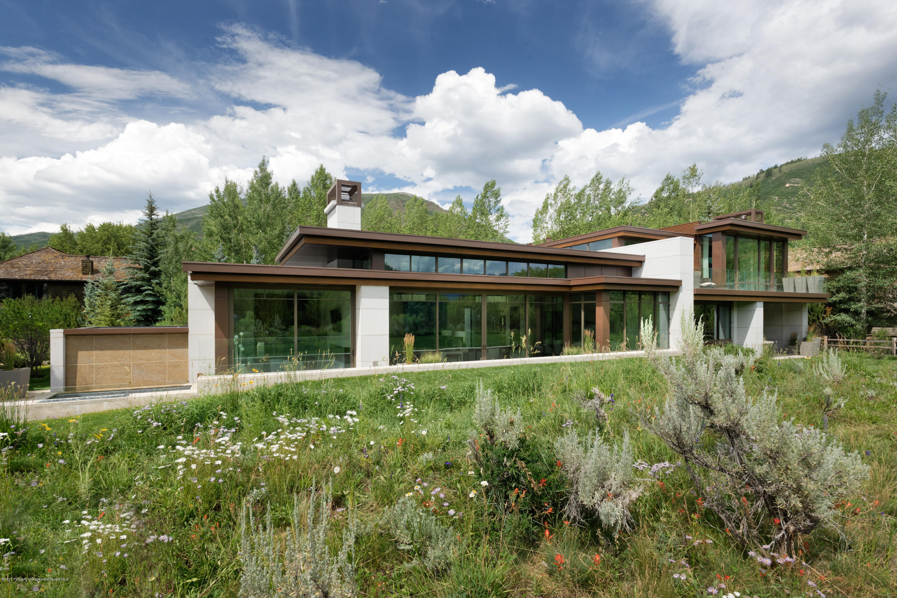 135 Miners Trail Road Aspen, CO 81611 - Photo 6 of 41 front view of a house with a yard