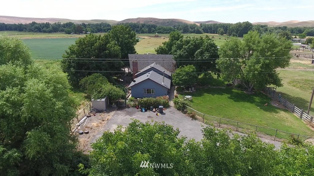 141 Rogers Road Prescott, WA 99348 - Photo 2 of 40 an aerial view of house with yard and lake view
