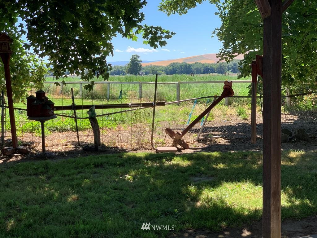 141 Rogers Road Prescott, WA 99348 - Photo 31 of 40 a view of yard with a slide