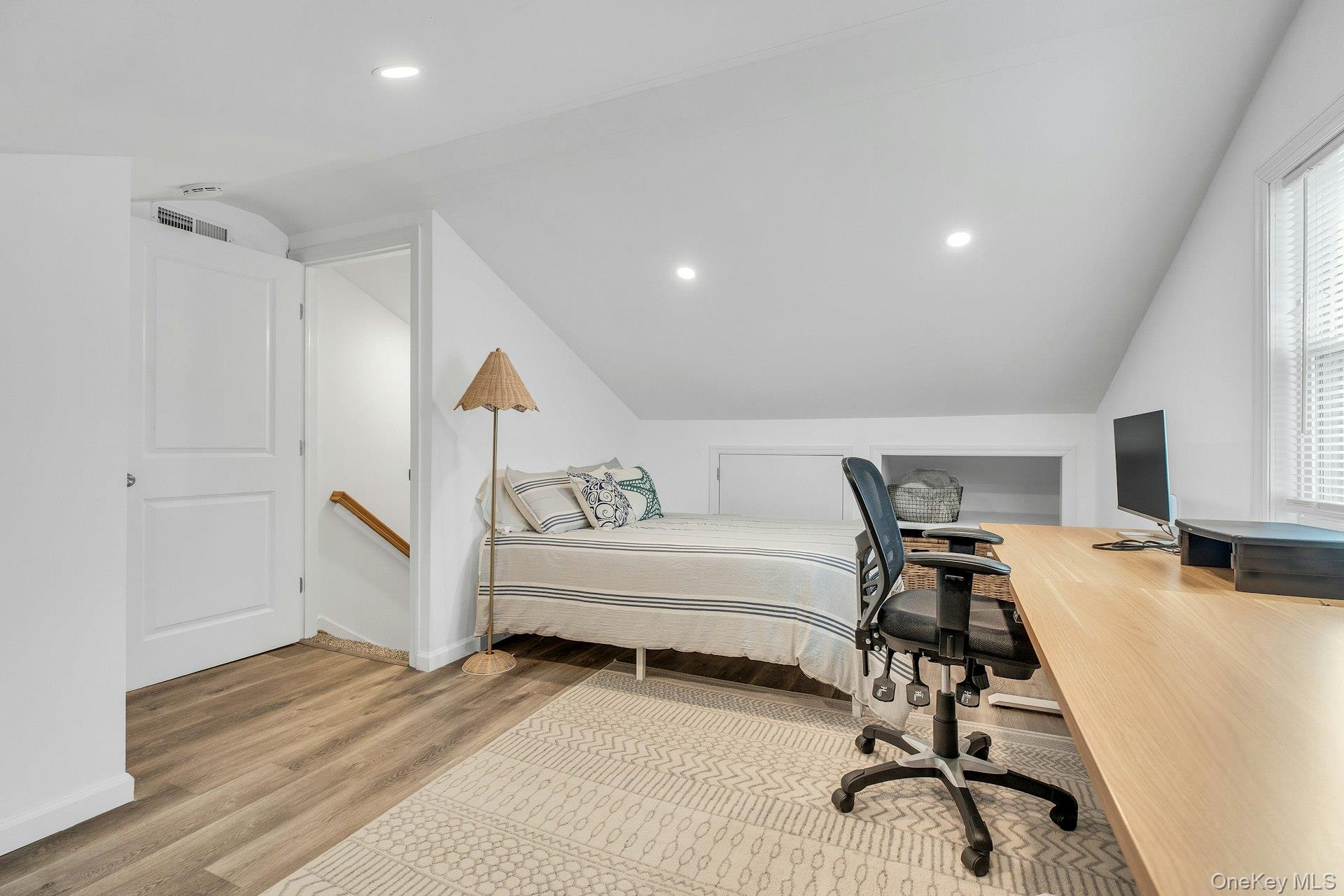 79 School Street Hampton Bays, NY 11946 - Photo 22 of 49 a view of a livingroom with furniture and windows