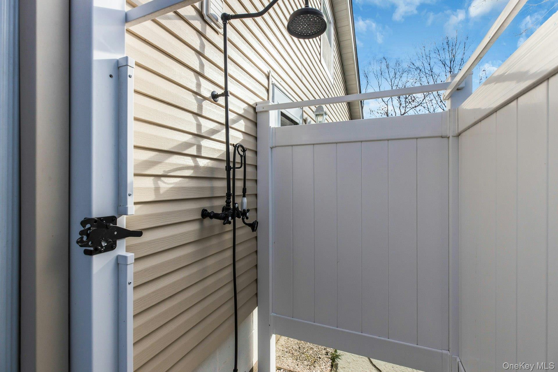 79 School Street Hampton Bays, NY 11946 - Photo 27 of 49 a view of entryway with a front door