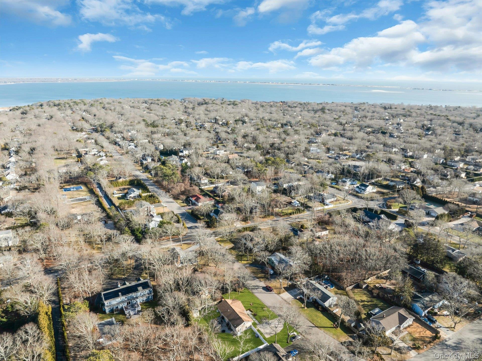79 School Street Hampton Bays, NY 11946 - Photo 39 of 49 an aerial view of multiple house