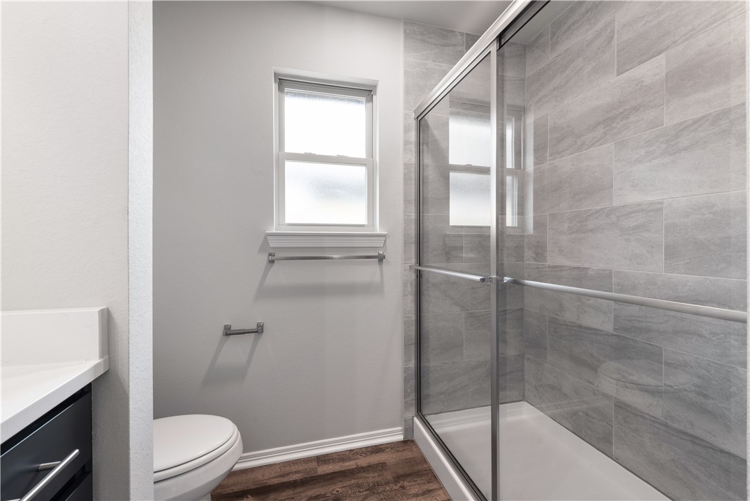 2869 Messenger Way Bryan, TX 77803 - Photo 16 of 23 a bathroom with a granite countertop bathtub shower sink vanity and toilet