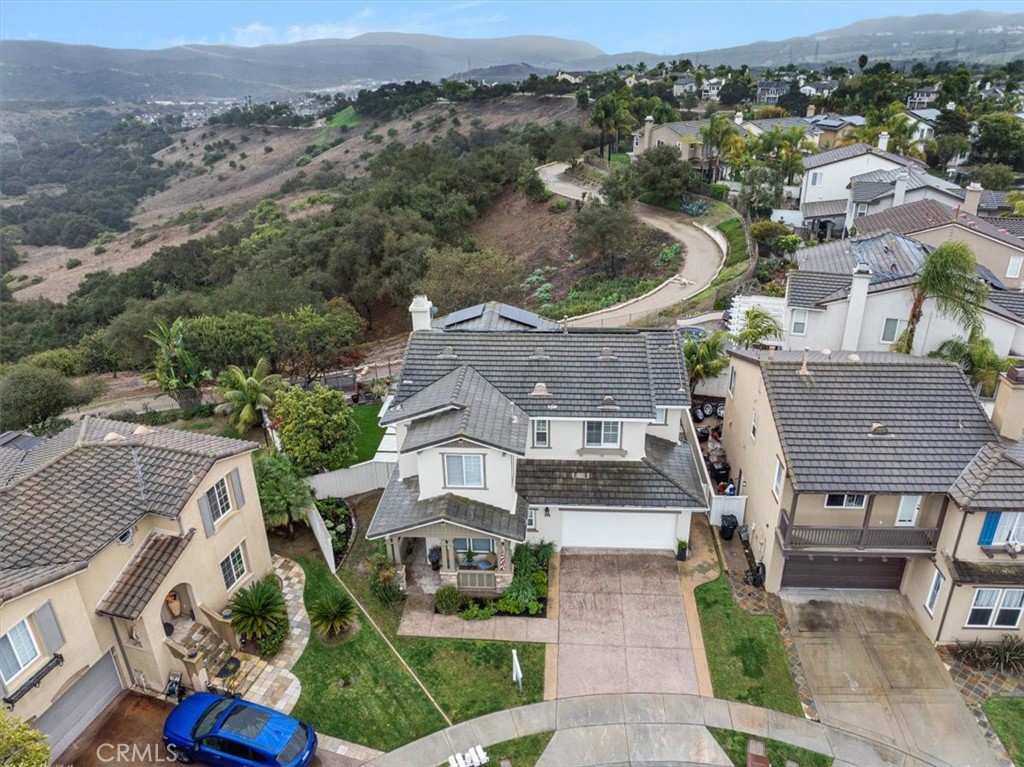 704 Corte Buscando San Clemente, CA 92673 - Photo 4 of 43 an aerial view of residential houses with outdoor space and parking