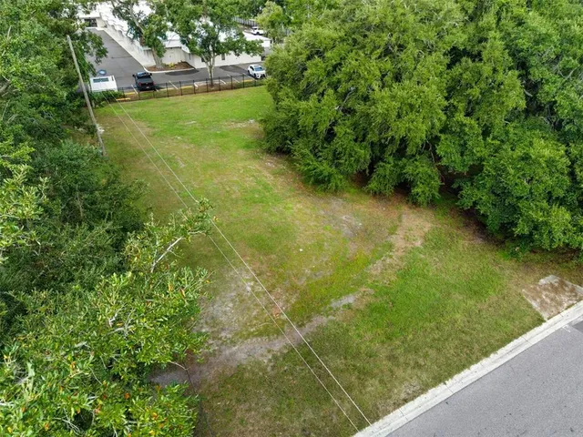 a view of a garden from a balcony