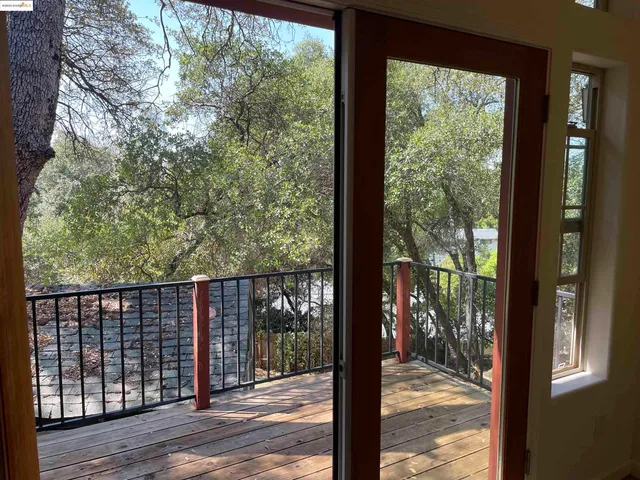 a view of a balcony with lake view