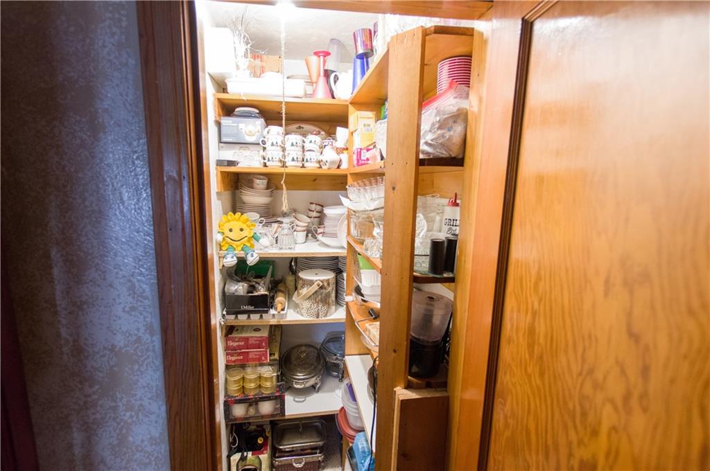 931 Liberty Street McKees Rocks, PA 15136 - Photo 15 of 41 a view of walk in closet with clothes and shoes