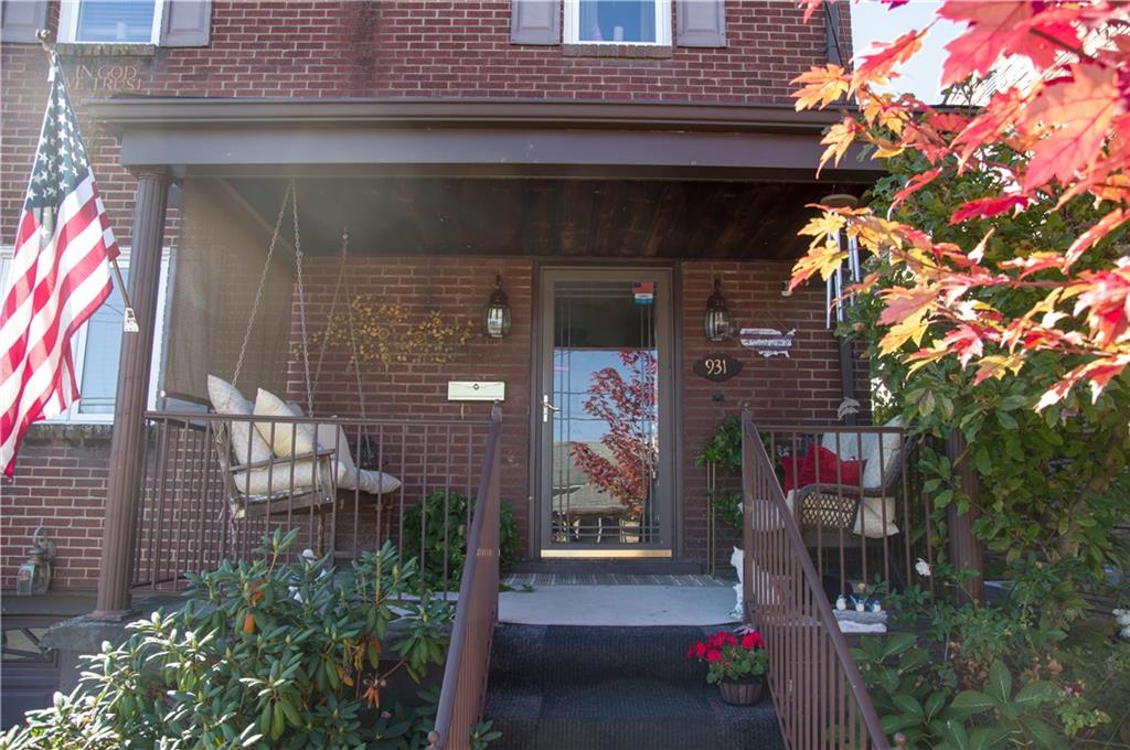 931 Liberty Street McKees Rocks, PA 15136 - Photo 2 of 41 a front view of a house with a yard