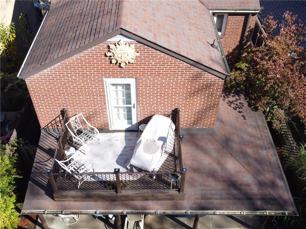 931 Liberty Street McKees Rocks, PA 15136 - Photo 35 of 41 a view of a chairs and table in backyard