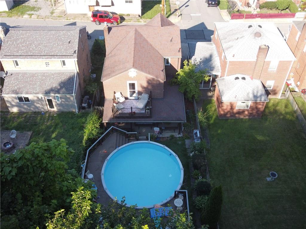 931 Liberty Street McKees Rocks, PA 15136 - Photo 39 of 41 an aerial view of a house with backyard space and swimming pool