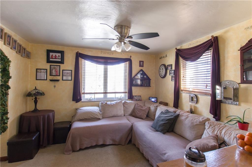 931 Liberty Street McKees Rocks, PA 15136 - Photo 8 of 41 a living room with furniture and a large window