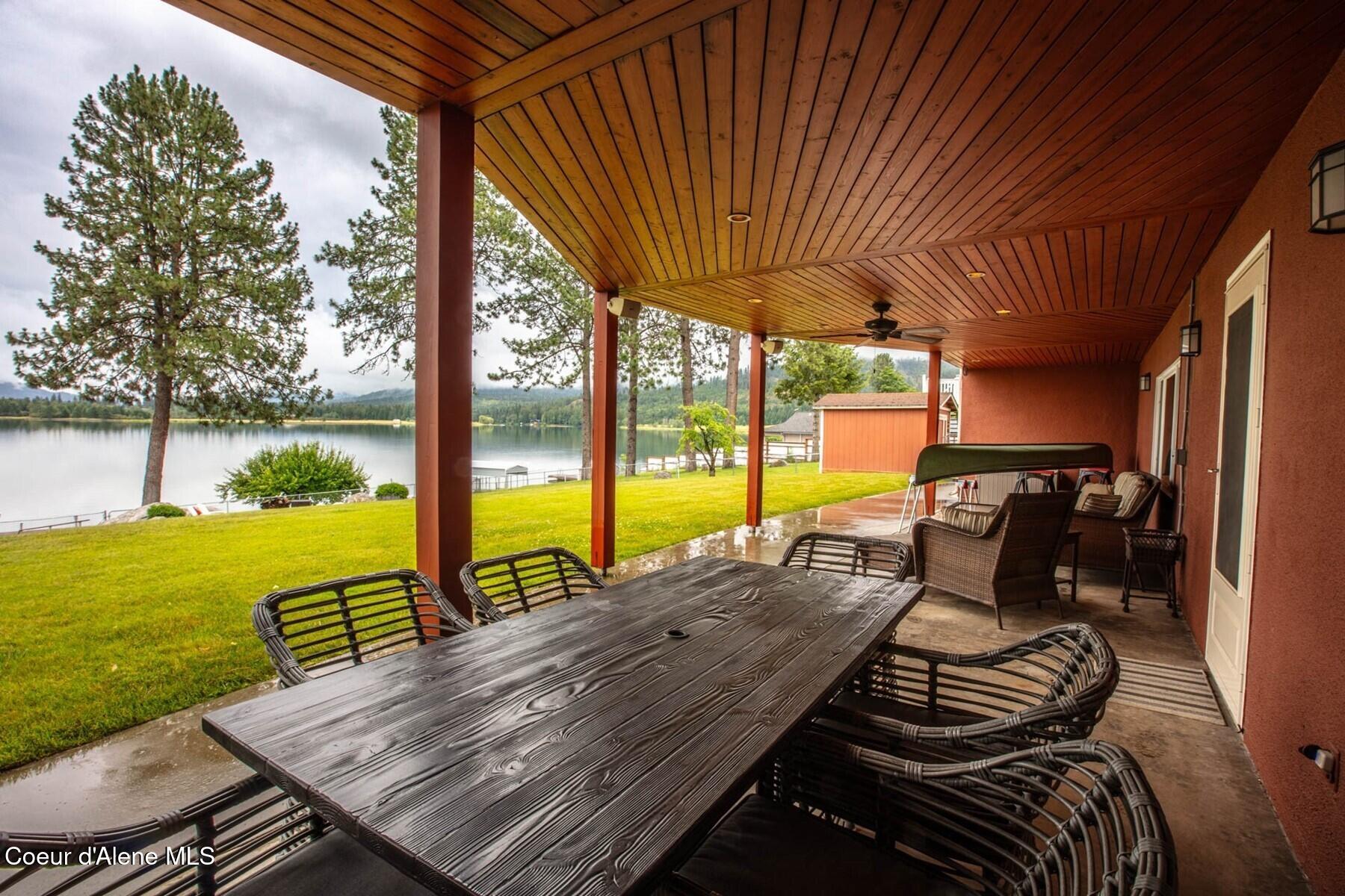 419 Campbell Point Road Laclede, ID 83841 - Photo 45 of 64 Covered Patio to Lush Lawn
