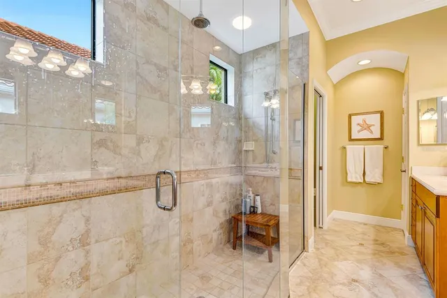 a view of a backyard with furniture and garden