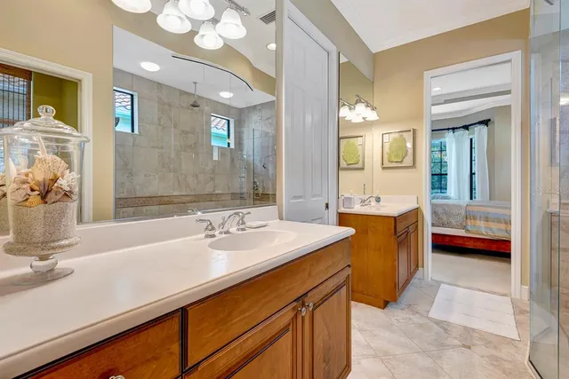 a view of a swimming pool with a patio and a yard