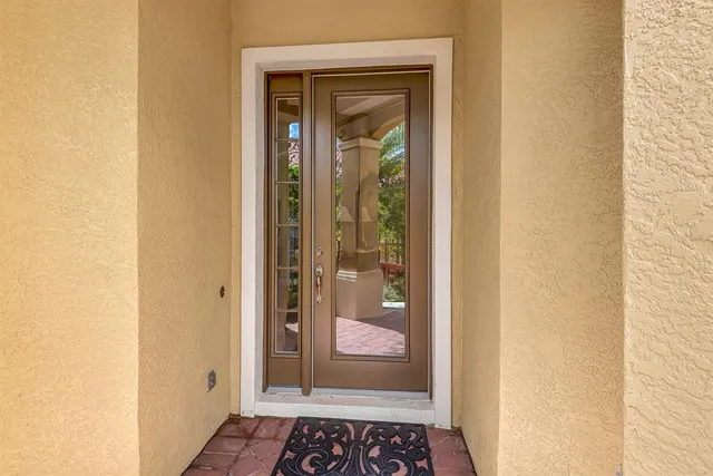 a view of a bathroom with a glass door
