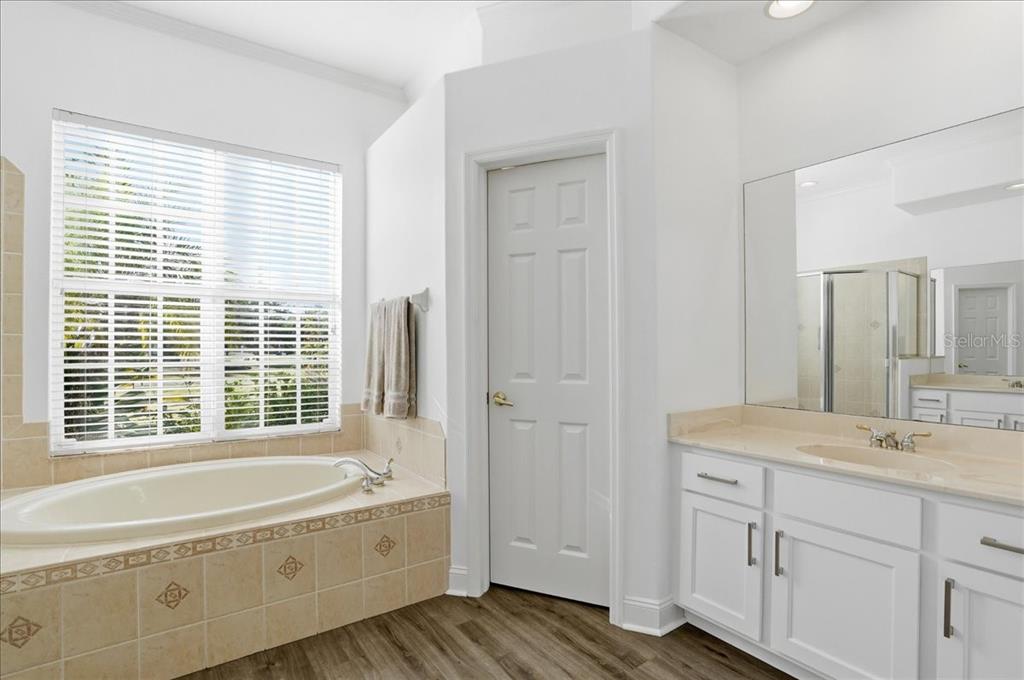 7601 226th Street East Bradenton, FL 34211 - Photo 27 of 50 a spacious bathroom with sink shower and bathtub