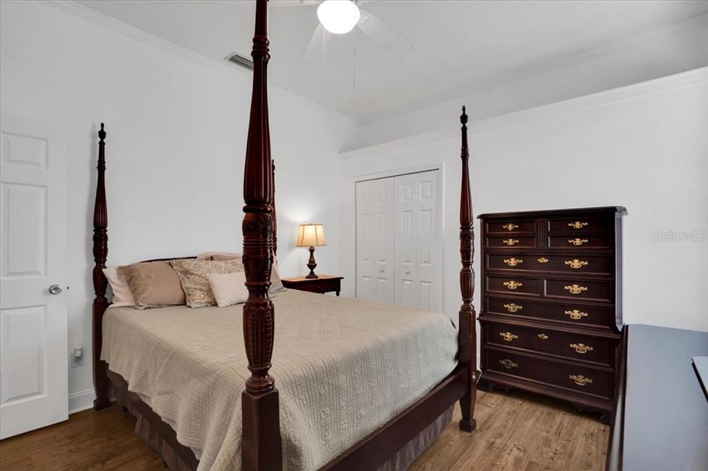 7601 226th Street East Bradenton, FL 34211 - Photo 28 of 50 a bedroom with a bed and a closet