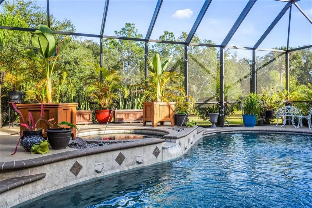 7601 226th Street East Bradenton, FL 34211 - Photo 6 of 50 a living room with large window and furniture