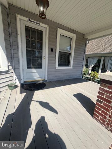 a view of a balcony with furniture