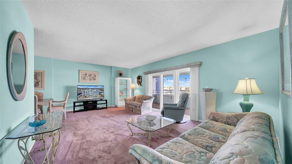 17400 Gulf Boulevard, Unit I4 North Redington Beach, FL 33708 - Photo 14 of 30 a living room with furniture and a fireplace