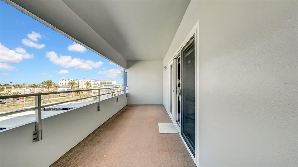 17400 Gulf Boulevard, Unit I4 North Redington Beach, FL 33708 - Photo 17 of 30 a view of a floor to ceiling window and an outdoor view