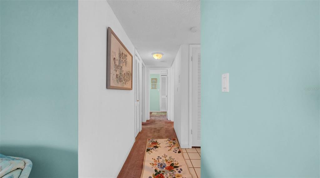 17400 Gulf Boulevard, Unit I4 North Redington Beach, FL 33708 - Photo 19 of 30 a view of a hallway with closet
