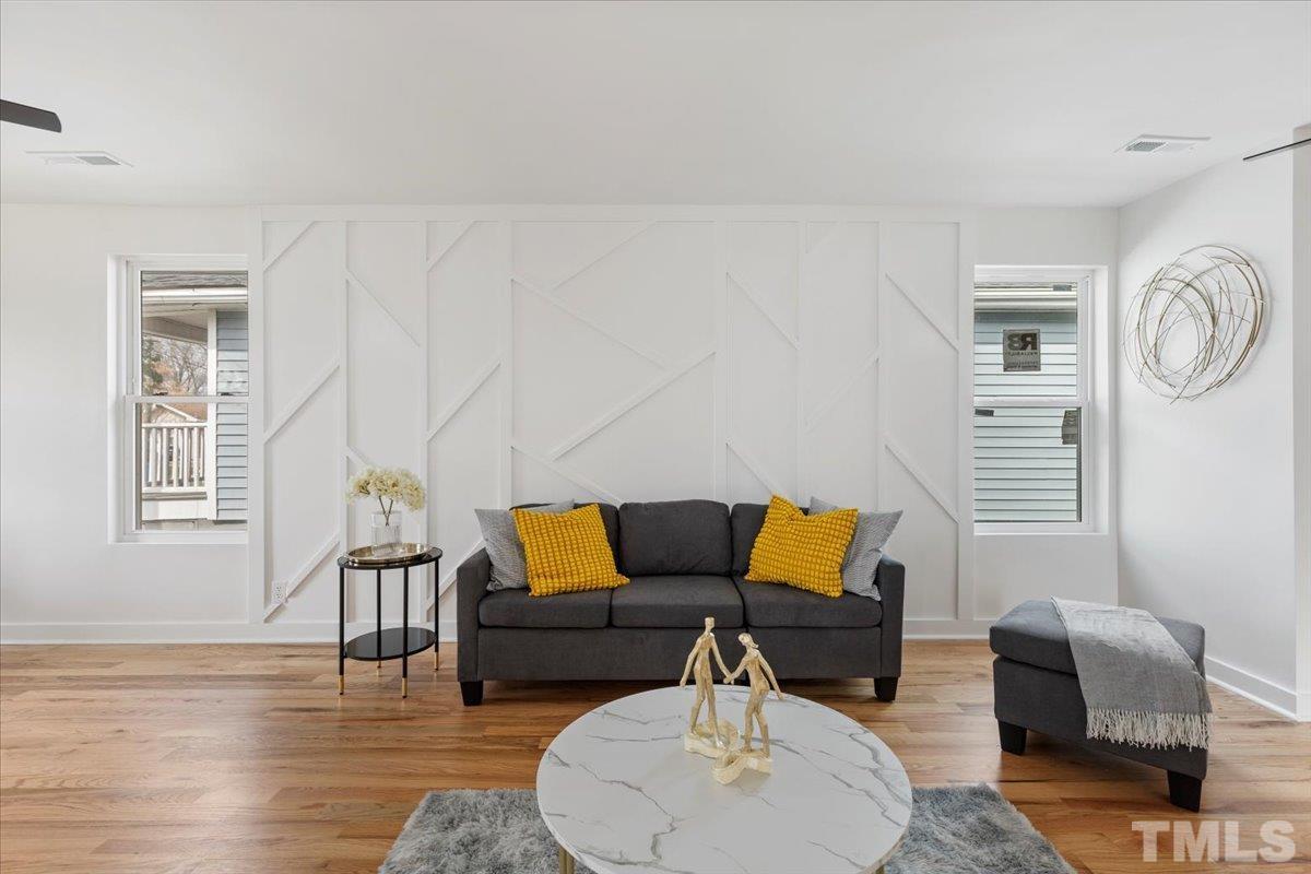 1100 Chester Street Durham, NC 27701 - Photo 16 of 43 a living room with furniture and a wooden floor