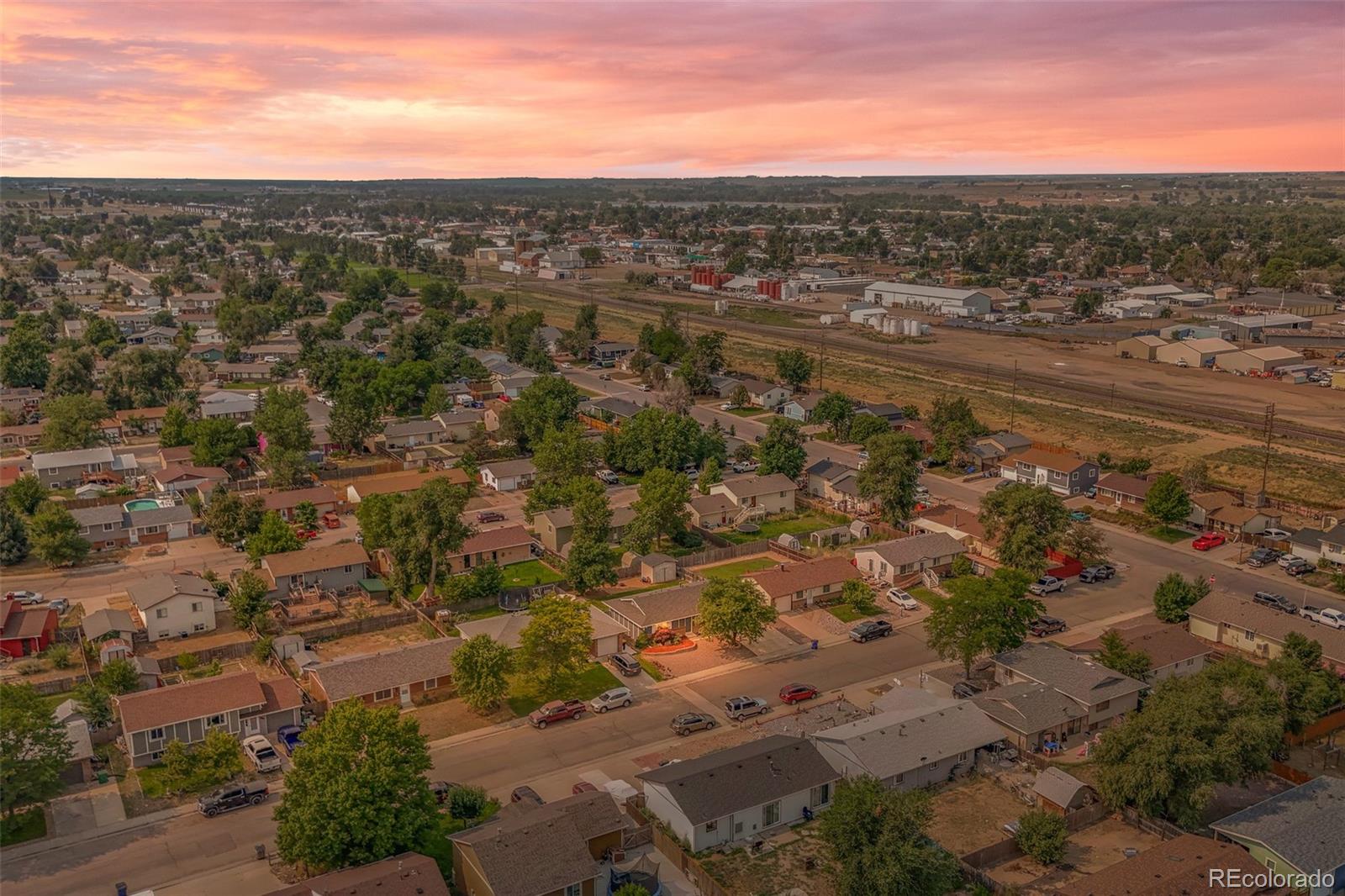 908 Trapper Drive Fort Lupton, CO 80621 - Photo 37 of 41 an aerial view of residential houses with outdoor space