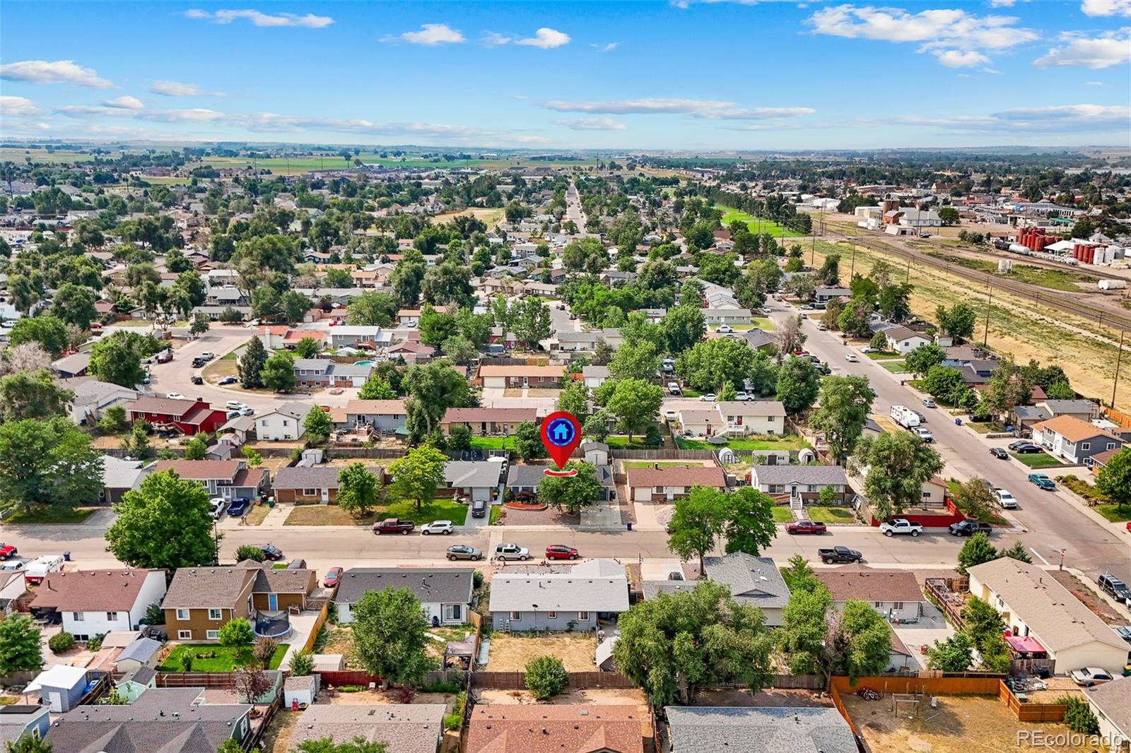 908 Trapper Drive Fort Lupton, CO 80621 - Photo 38 of 41 an aerial view of a city