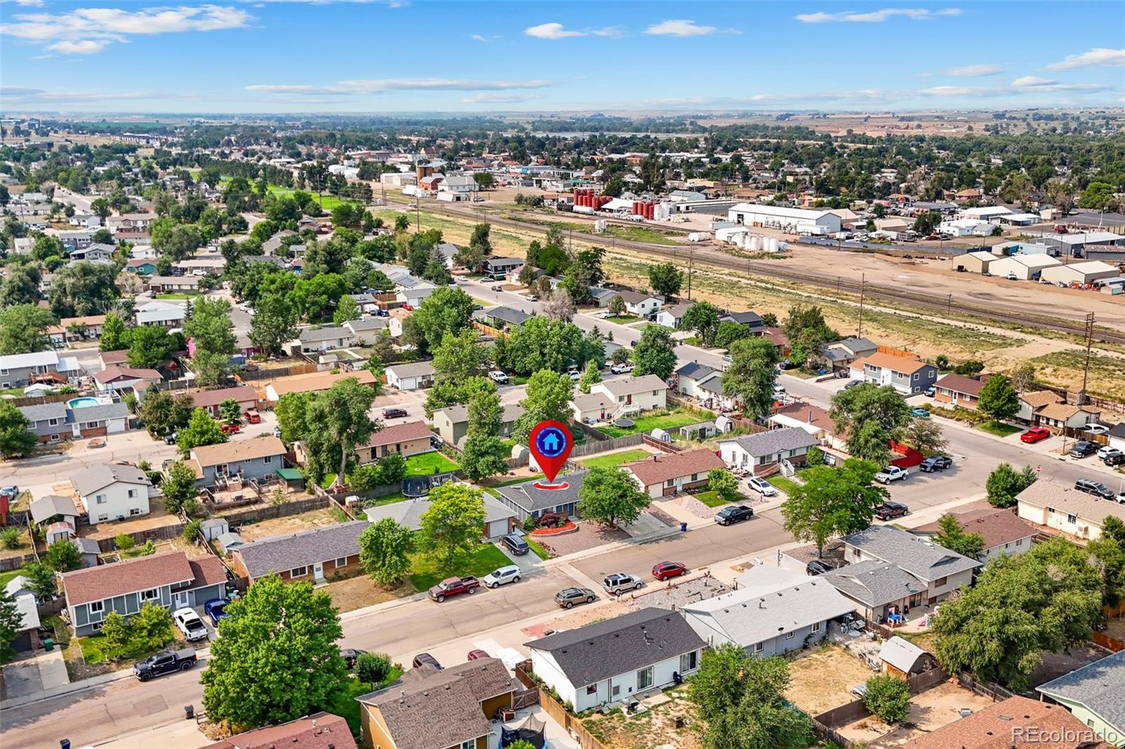 908 Trapper Drive Fort Lupton, CO 80621 - Photo 40 of 41 an aerial view of residential houses with outdoor space