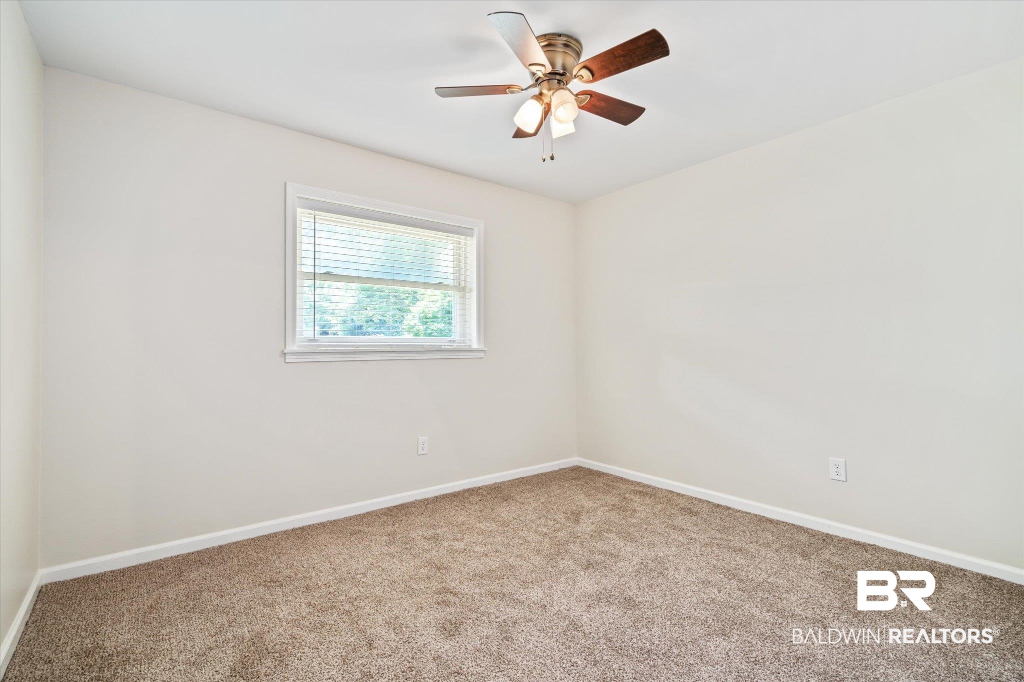 3325 Lacoste Road Mobile, AL 36618 - Photo 15 of 35 Empty room featuring carpet and ceiling fan