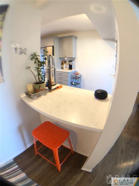 57 Judson Street, Unit 1B Edison, NJ 08837 - Photo 5 of 21 a room with table chairs and entryway