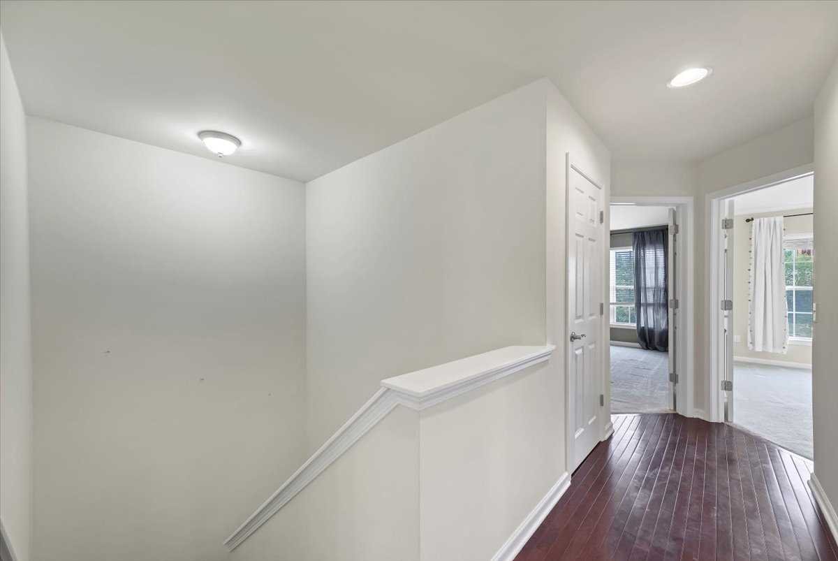 2507 Sylvan Loop Fishkill, NY 12590 - Photo 13 of 37 a view of an empty room with wooden floor and a window
