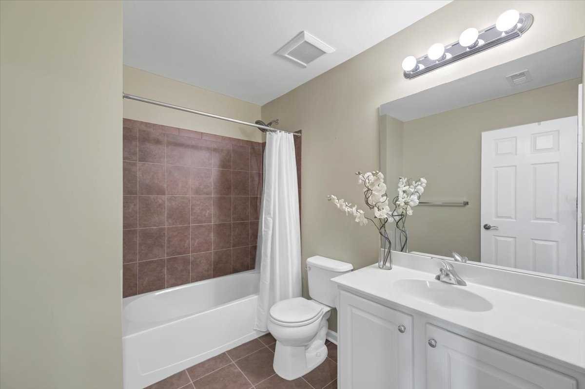 2507 Sylvan Loop Fishkill, NY 12590 - Photo 22 of 37 a bathroom with a sink a toilet and shower