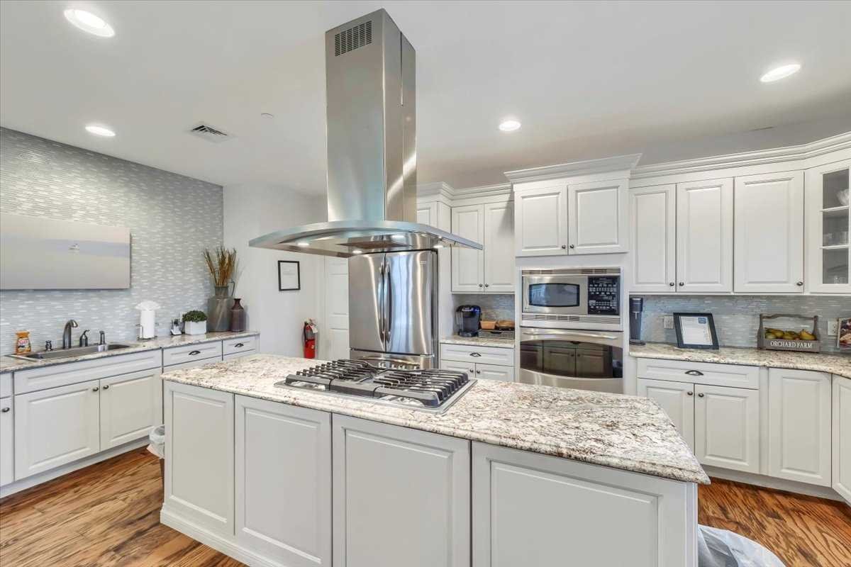 2507 Sylvan Loop Fishkill, NY 12590 - Photo 32 of 37 a kitchen with stainless steel appliances granite countertop a sink stove and refrigerator
