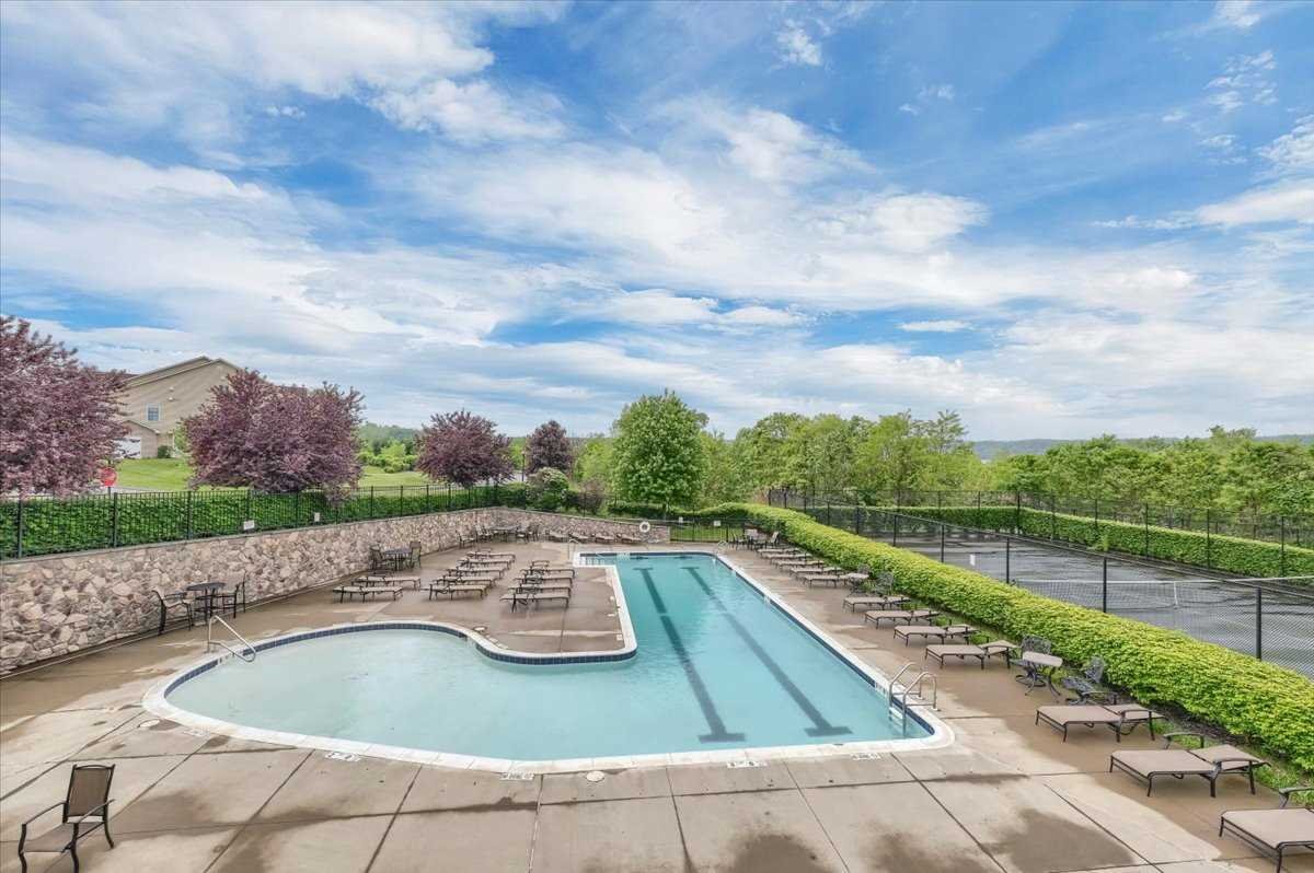 2507 Sylvan Loop Fishkill, NY 12590 - Photo 33 of 37 a view of a swimming pool with a yard