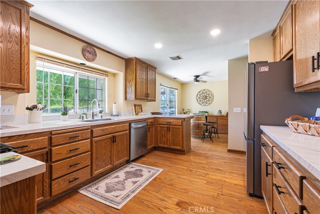 2085 Hanging Tree Lane Templeton, CA 93465 - Photo 10 of 33 Spacious open & airy Kitchen w/new porcelain countertops, stainless built-in appliances, lots of cabinets.