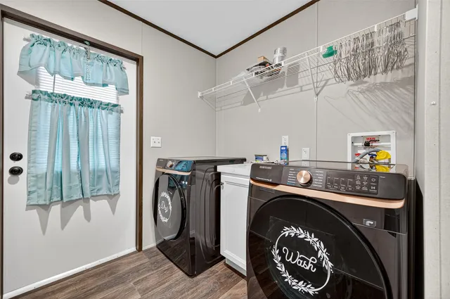 a utility room with dryer and washer