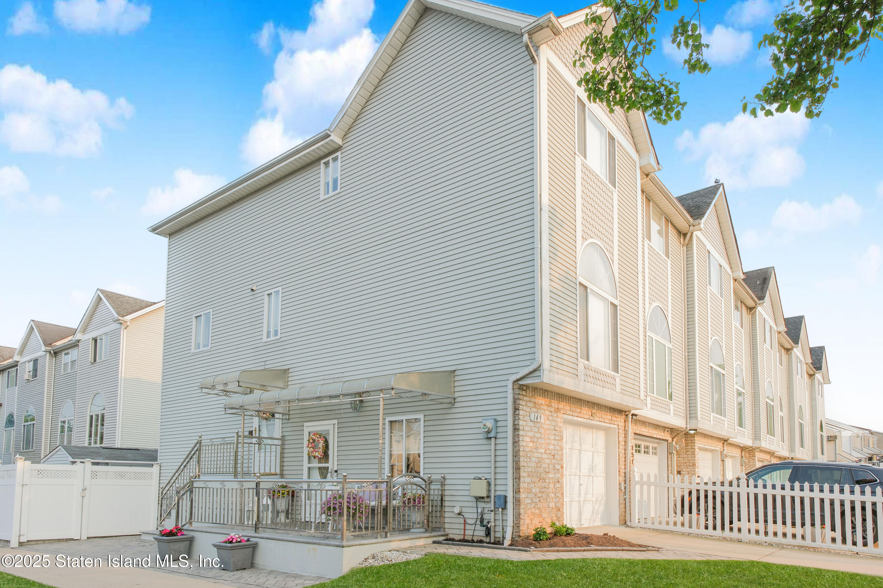 a view of a building with a yard