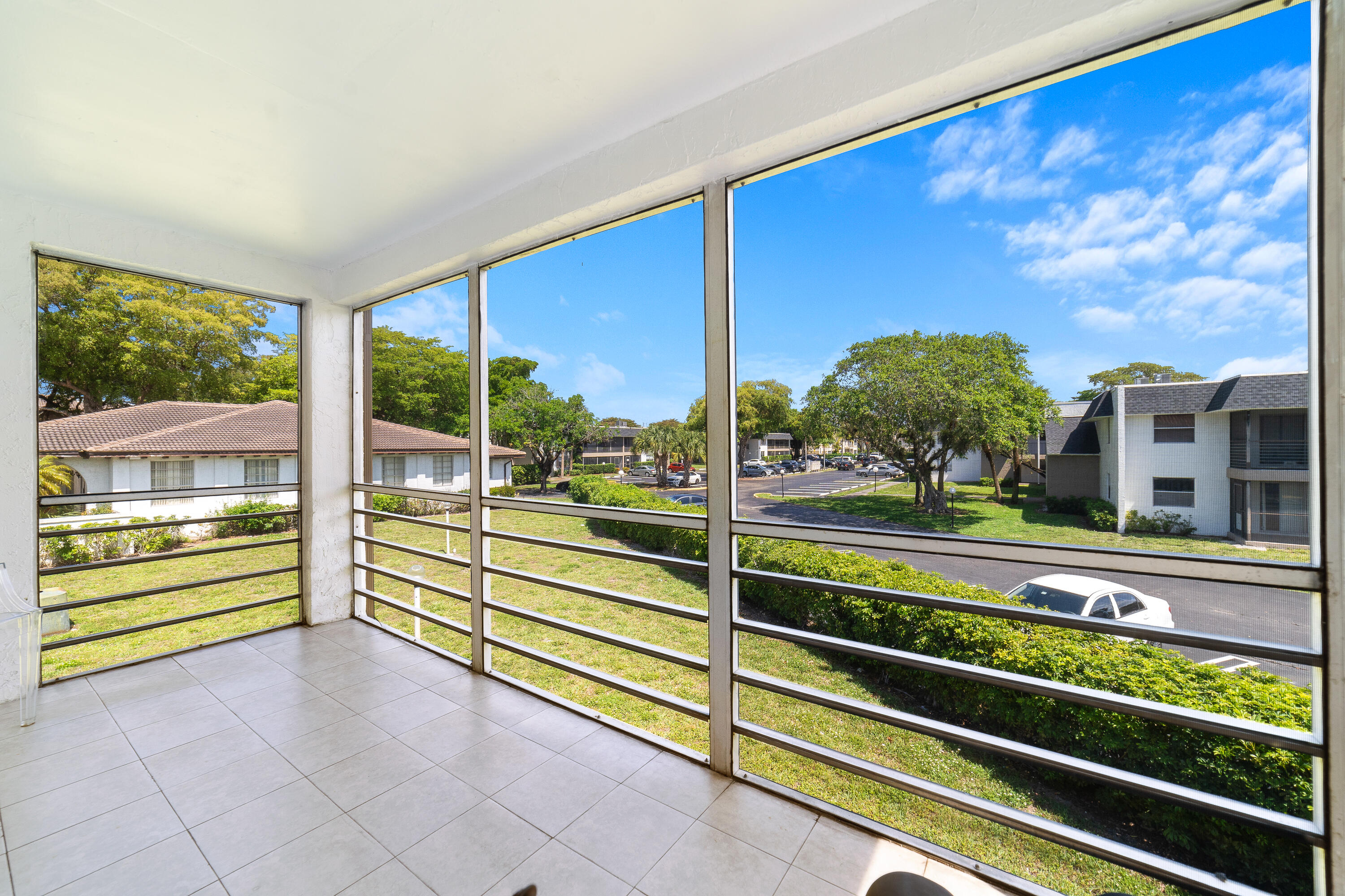 2710 Riverside Drive, Unit 201A Coral Springs, FL 33065 - Photo 17 of 23 a view of a building from a balcony