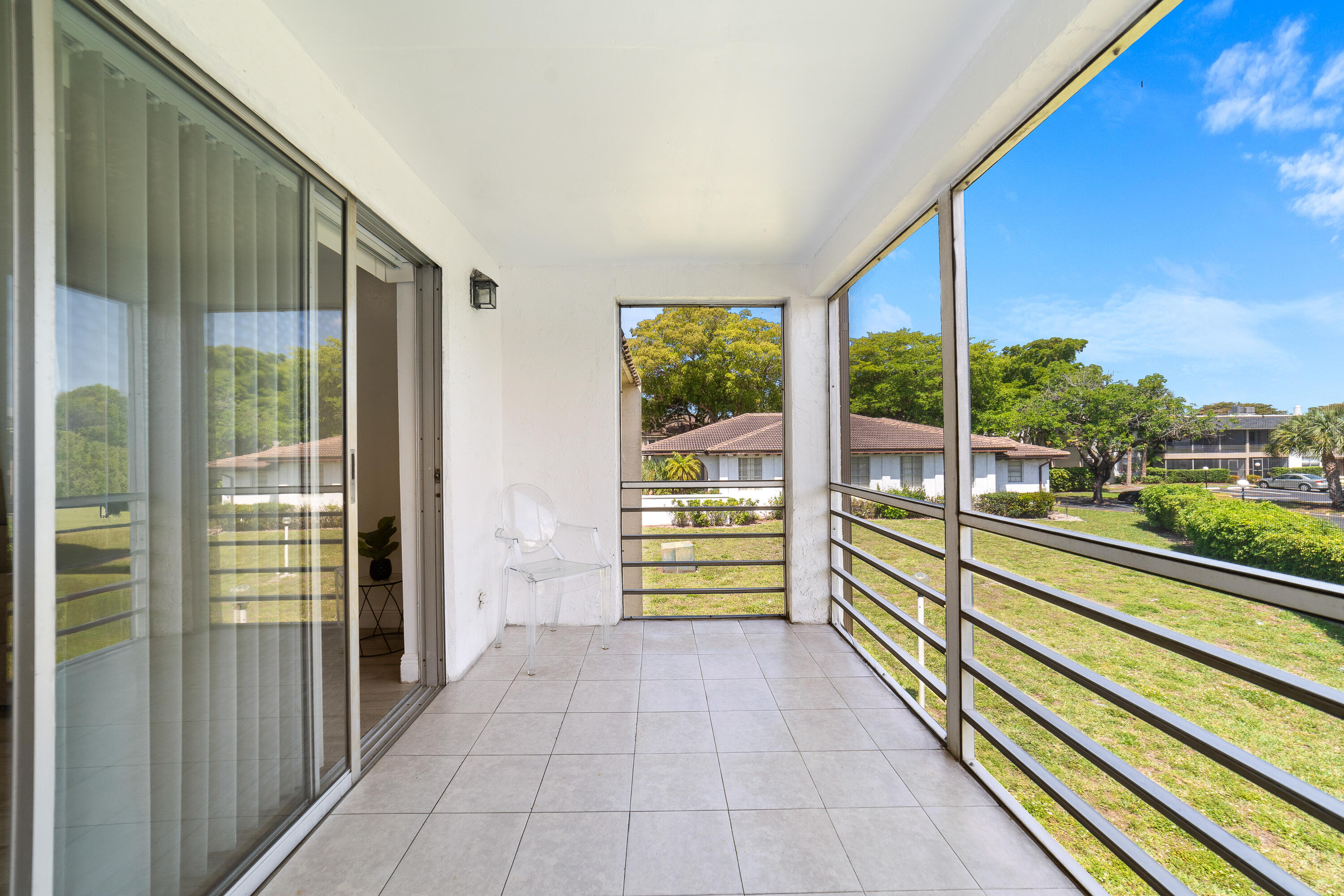 2710 Riverside Drive, Unit 201A Coral Springs, FL 33065 - Photo 18 of 23 a view of a building from the stairs