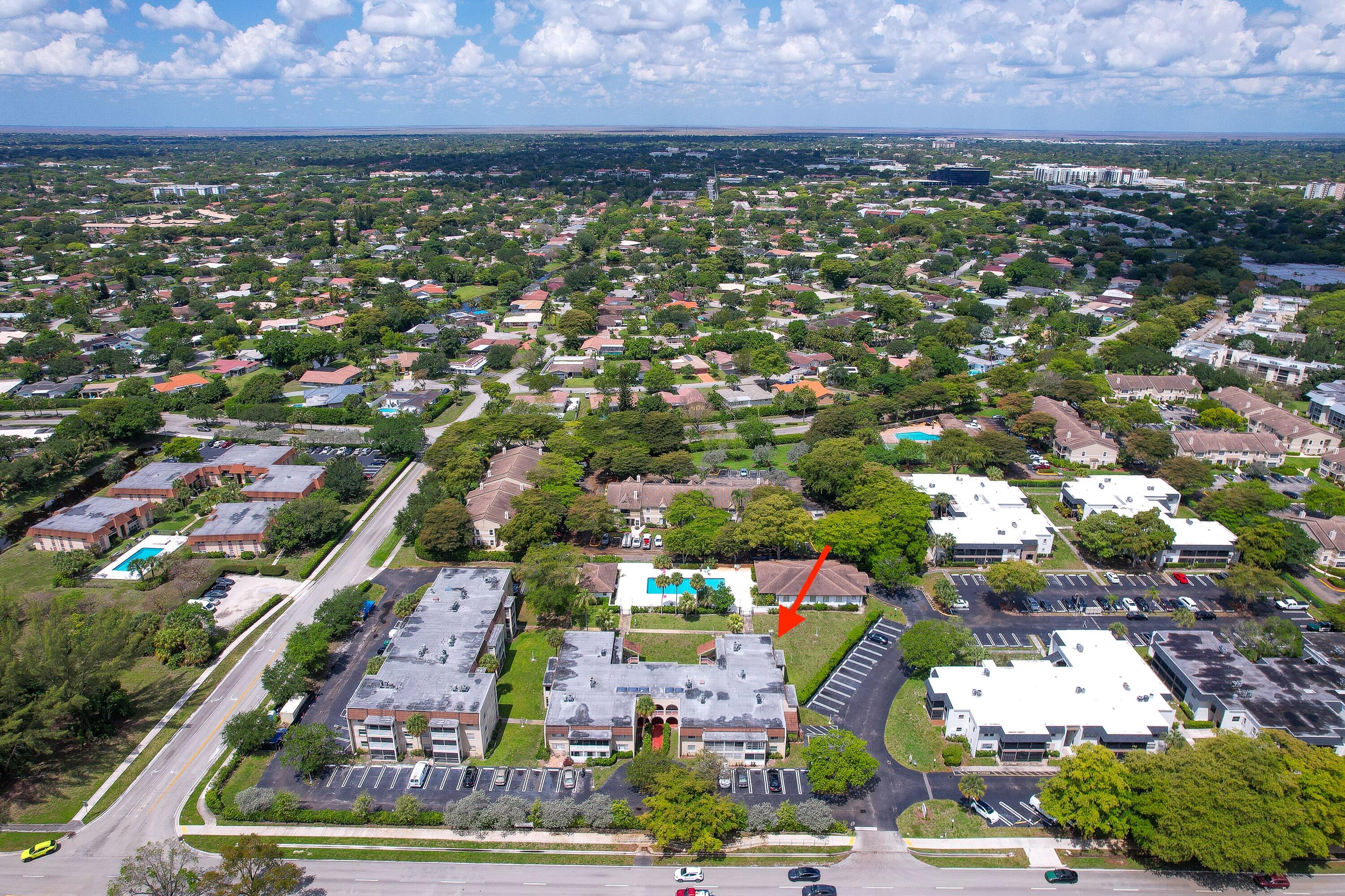 2710 Riverside Drive, Unit 201A Coral Springs, FL 33065 - Photo 20 of 23 an aerial view of multiple house