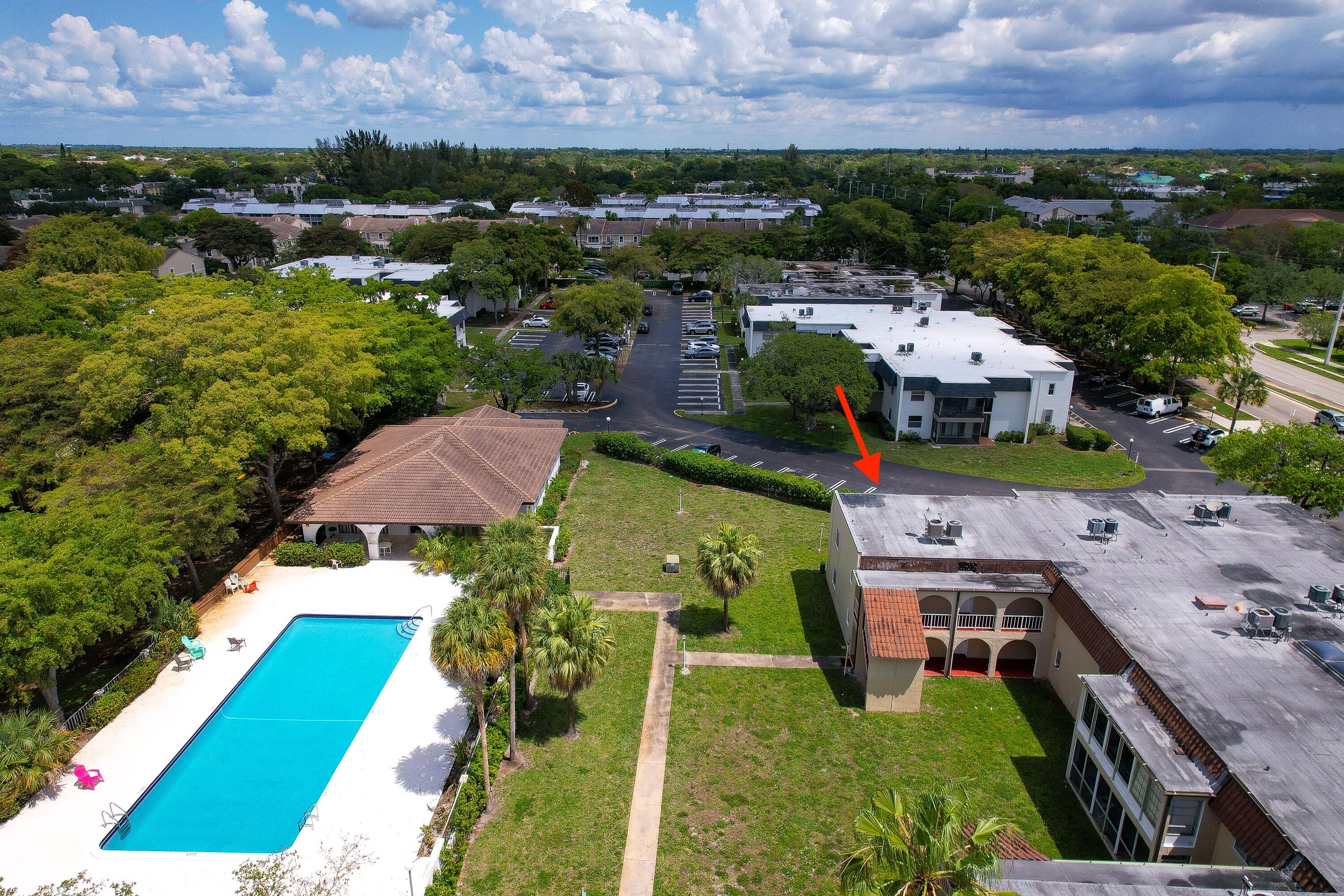2710 Riverside Drive, Unit 201A Coral Springs, FL 33065 - Photo 21 of 23 an aerial view of multiple houses with yard