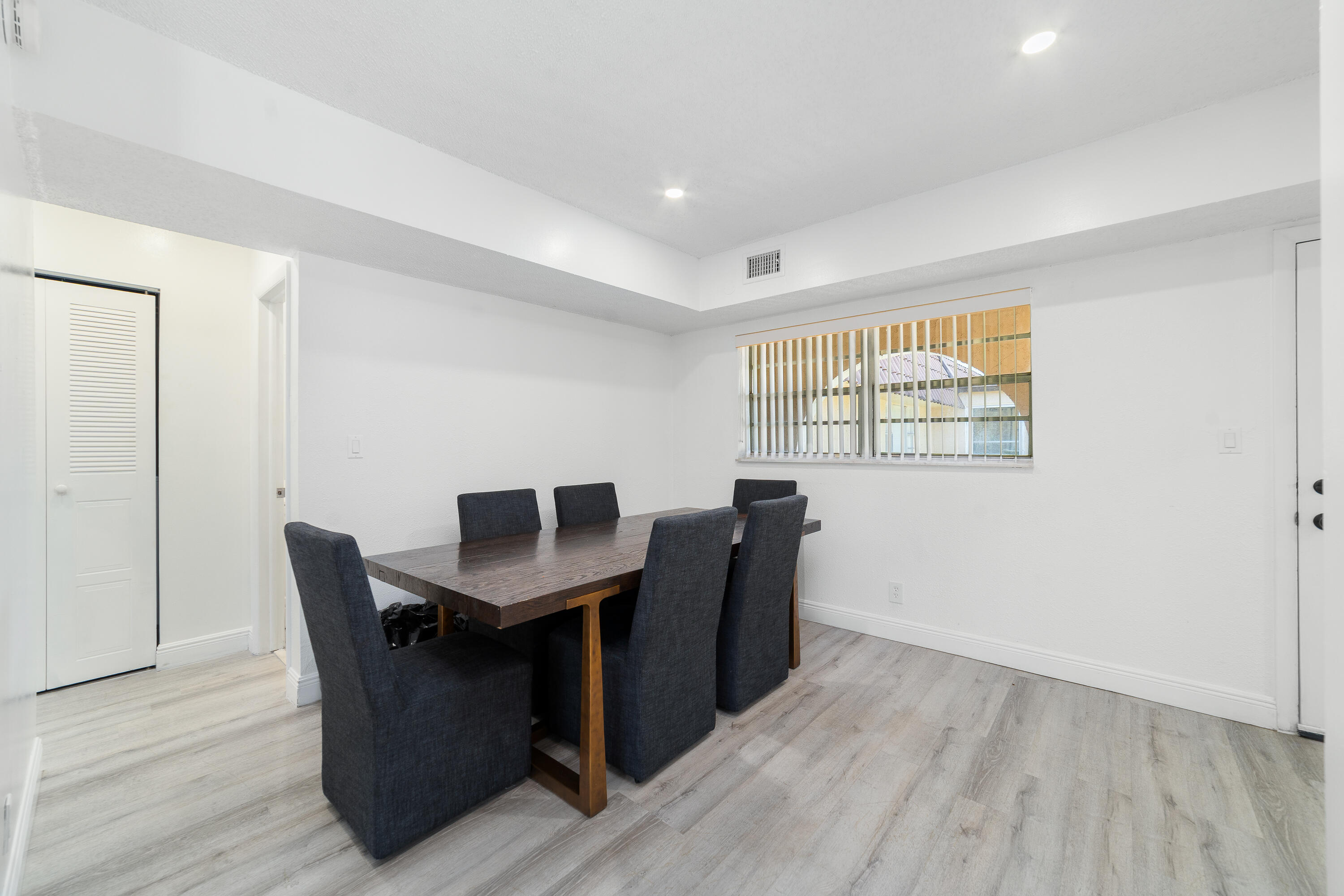 2710 Riverside Drive, Unit 201A Coral Springs, FL 33065 - Photo 10 of 23 a workspace with furniture and window