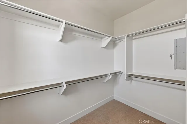 a view of an empty walk in closet