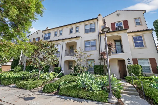 a front view of a multi story residential apartment buildings