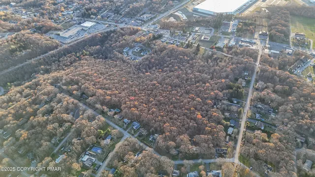 a aerial view of a house with a yard