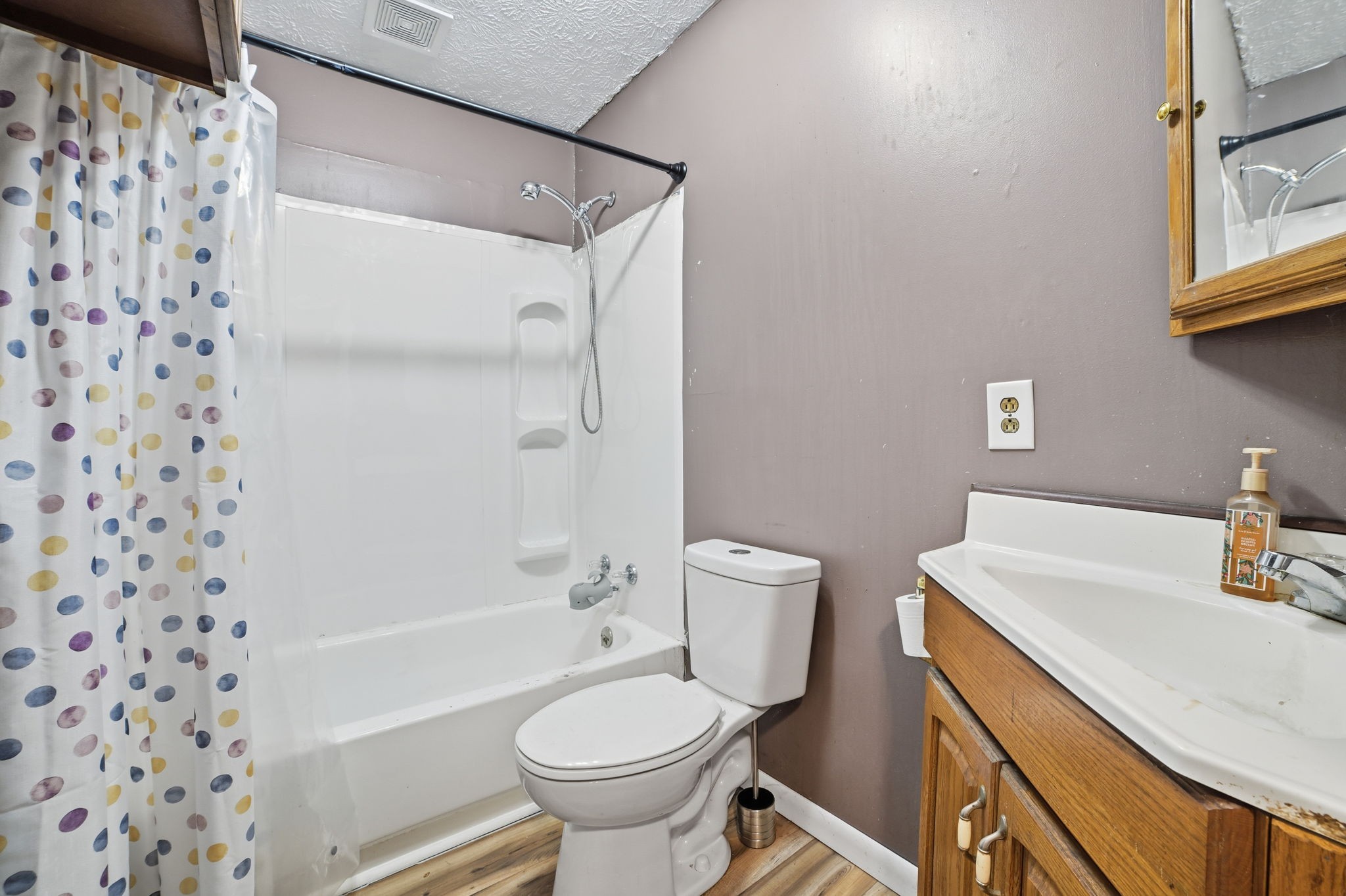 428 Scarborough Hollow Road Stewart, TN 37175 - Photo 19 of 28 a bathroom with a sink toilet and shower